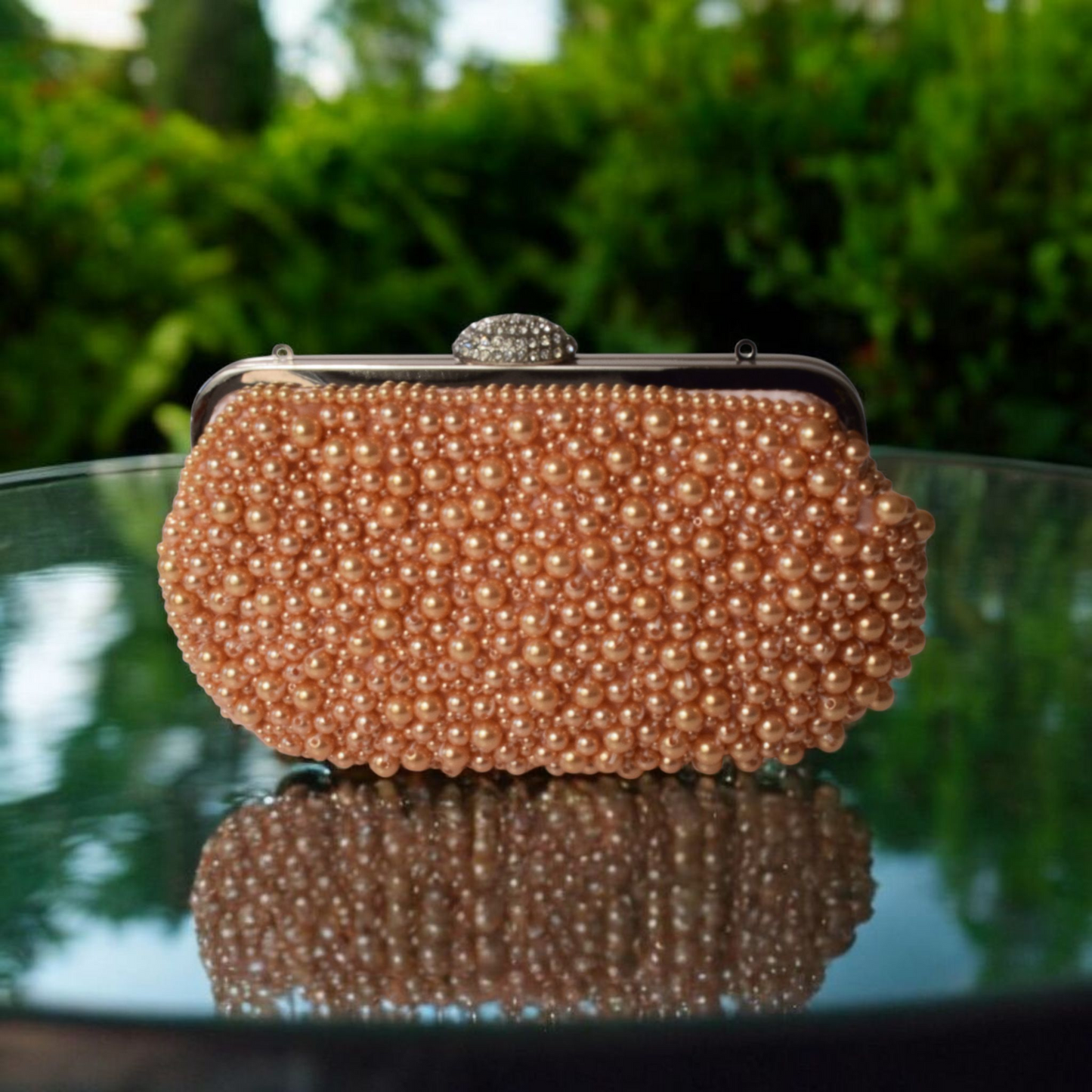 Elegant bronze floral-patterned evening purse fully embellished with shimmering pearl beads.