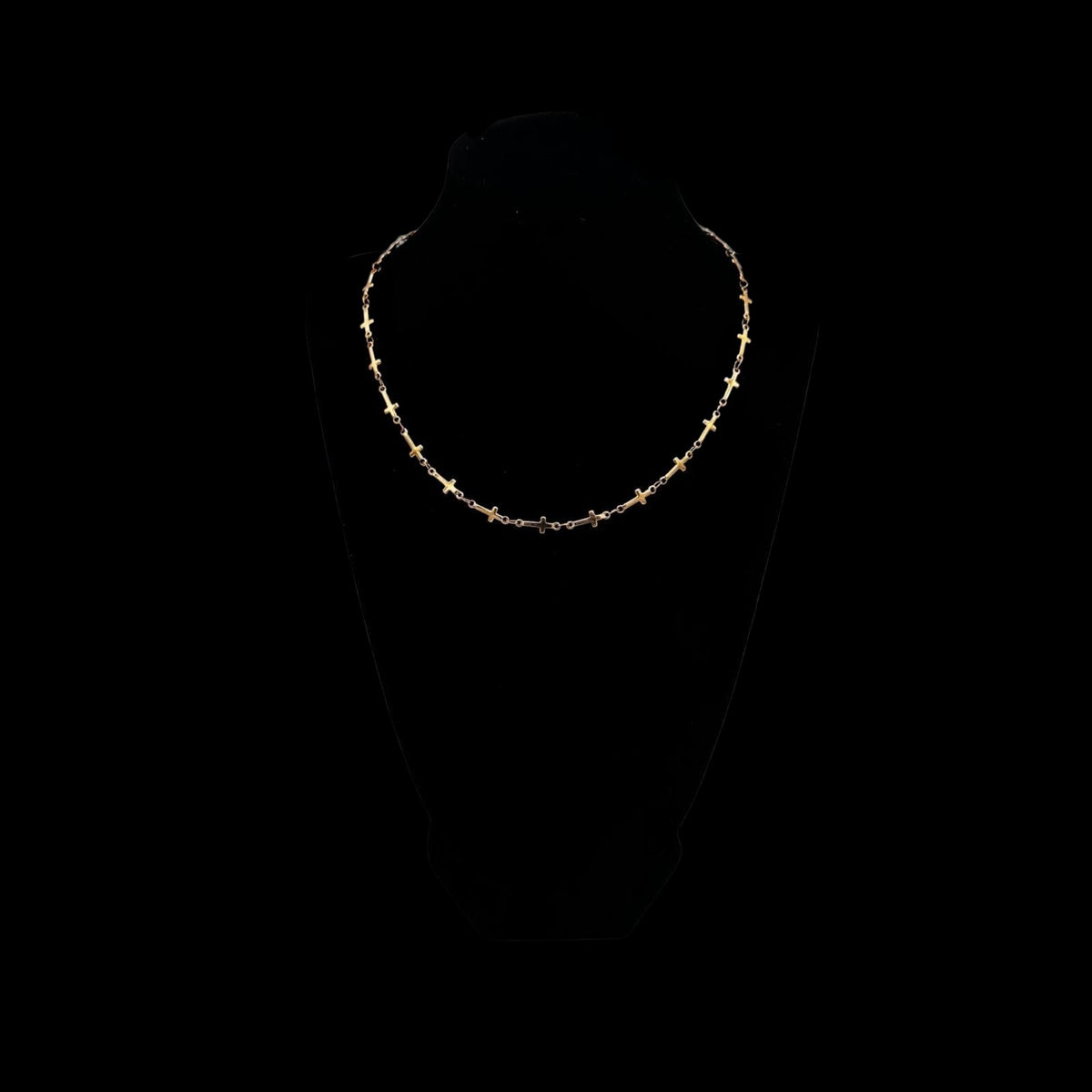 Gold bracelet on a black background