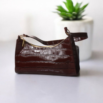 Croc Embossed Classic Clutch Bag vegan leather women's handbag on plain background