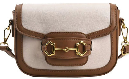 Dorole Horse Bitbuckle Bag flap shoulder handbag on plain background