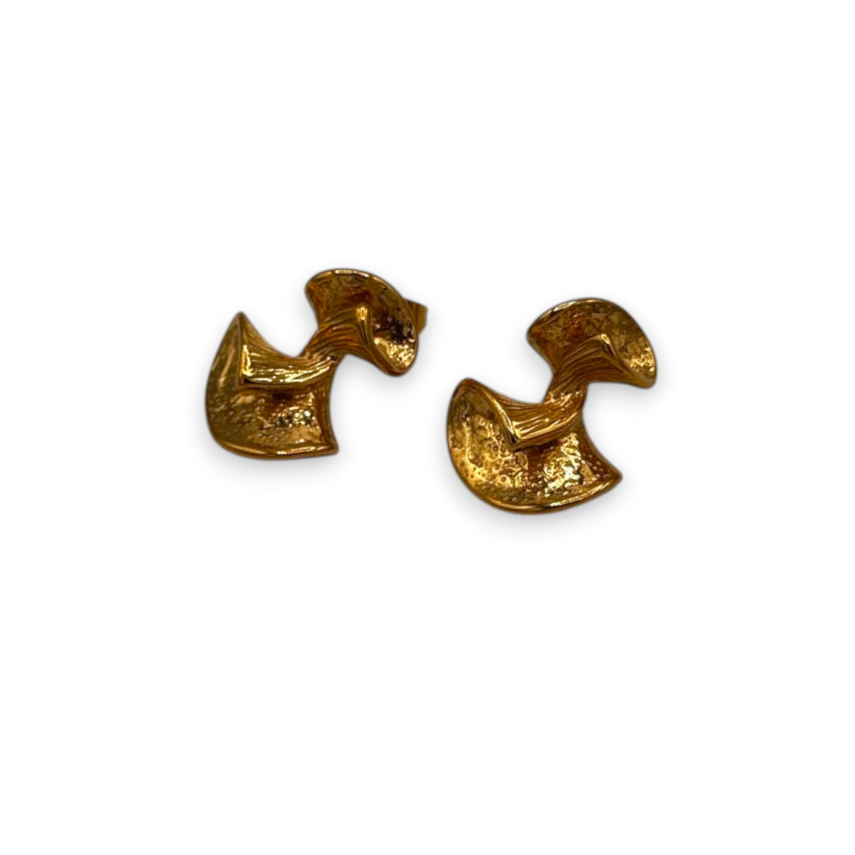 Pair of gold abstract muse studs earrings on a white background