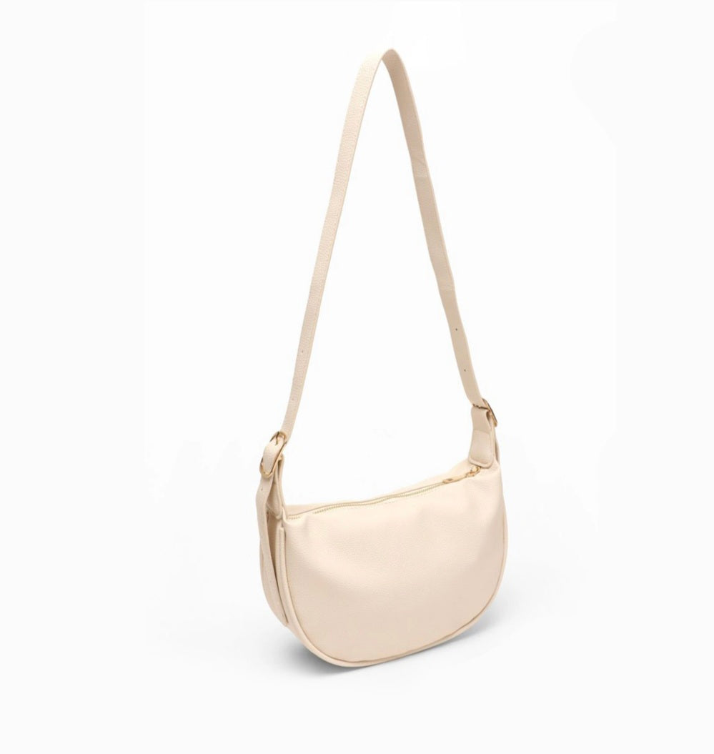 Dorole Ambra Crossbody Bag in black showcasing sleek design and adjustable strap for style and functionality.