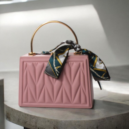 Dorole Bow Evening Bag with a structured silhouette and decorative bow ribbon, perfect for evening wear.
