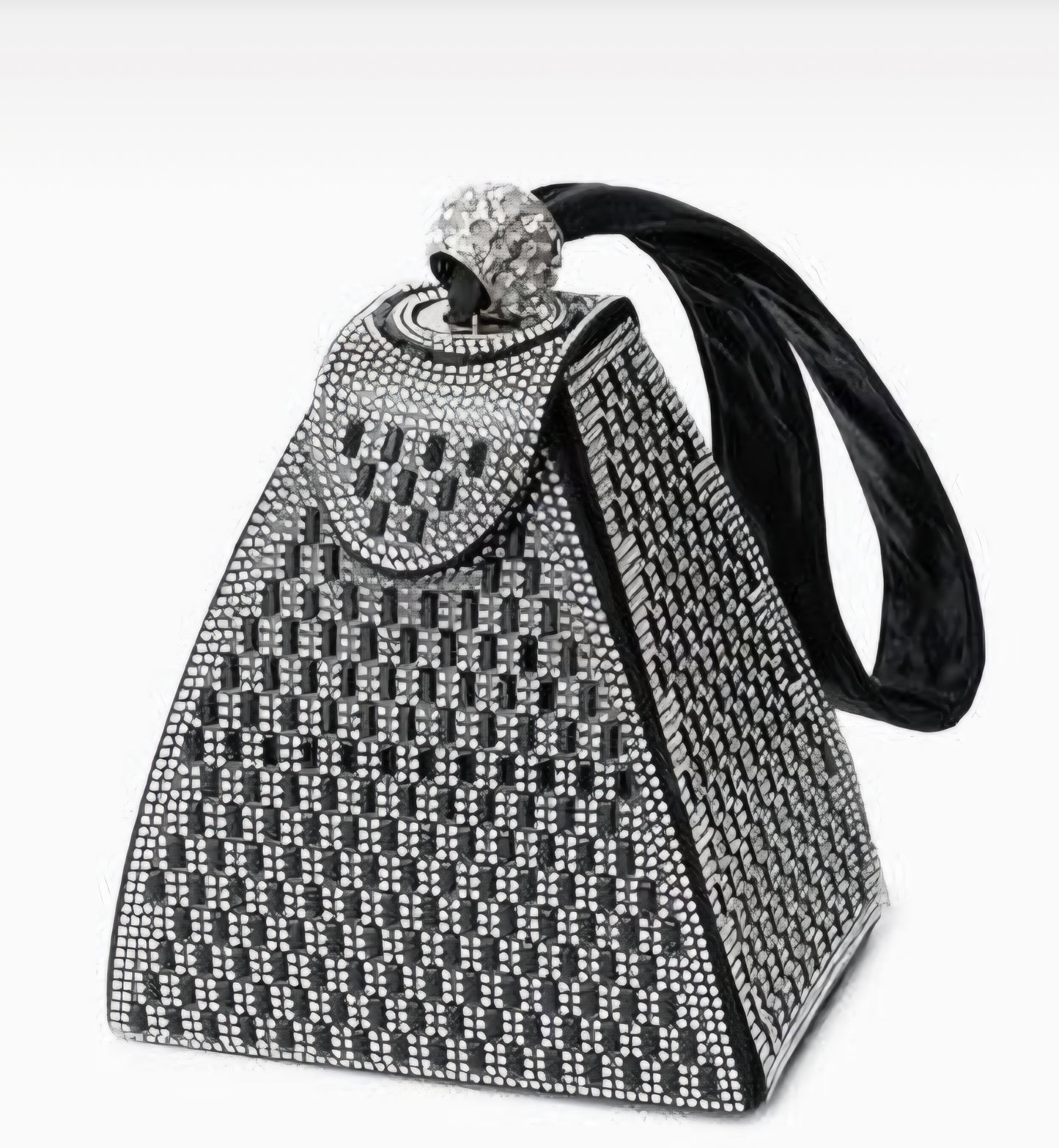 Decorative cowbell with rhinestone embellishments on a white background