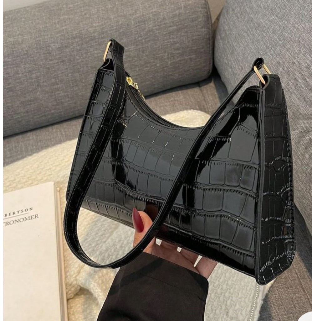 Croc Embossed Classic Clutch Bag vegan leather women's handbag on plain background