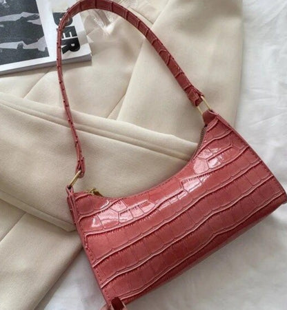 Croc Embossed Classic Clutch Bag vegan leather women's handbag on plain background