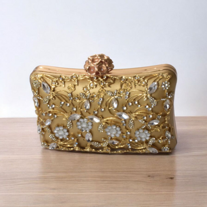Dorole Sparkle Clutch with Rhinestones featuring elegant floral design and gold finish.