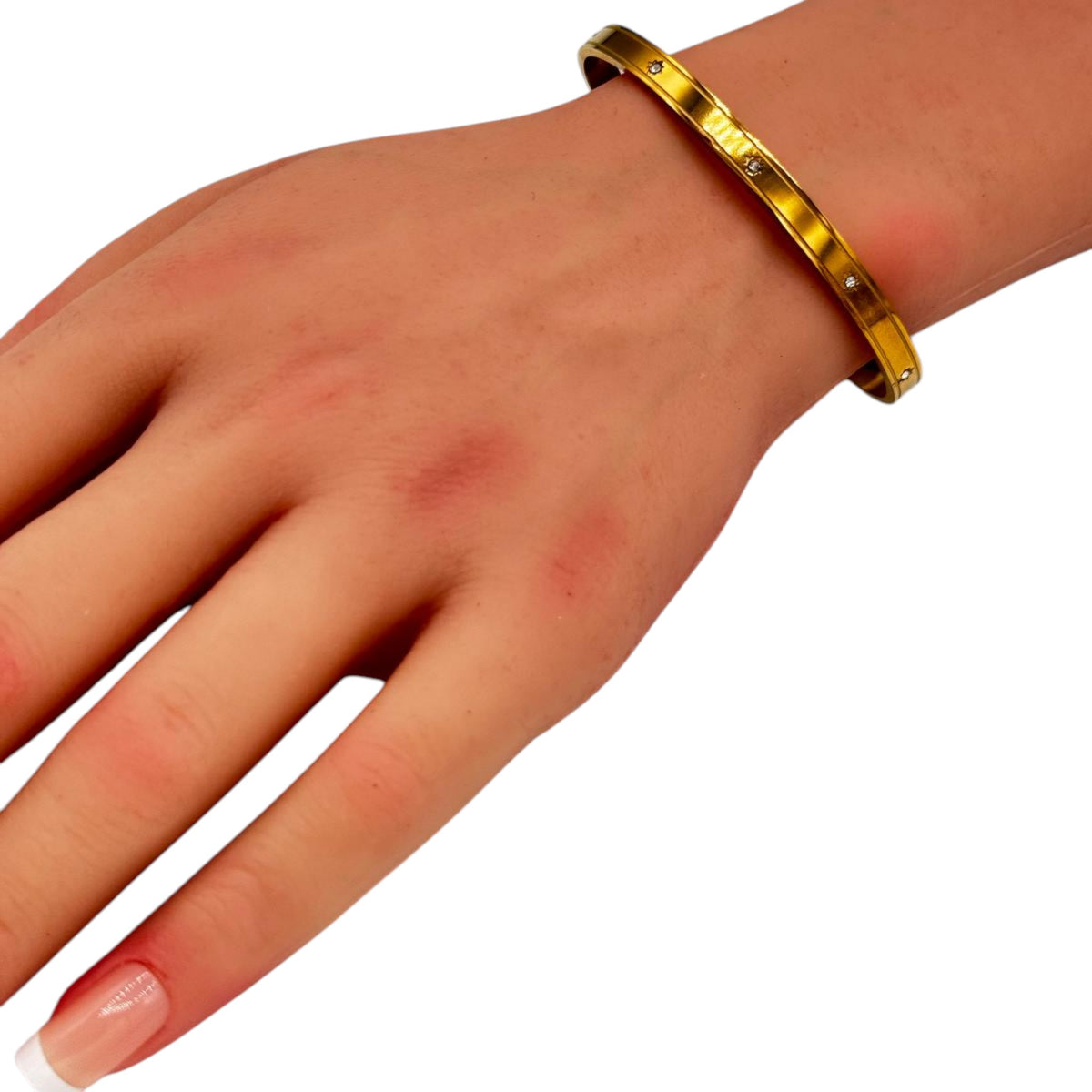 Knot Cuff Bracelet sleek gold open cuff worn on woman wrist