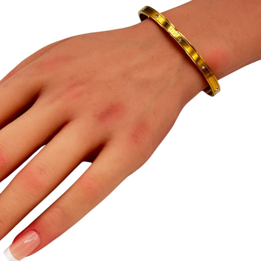 Knot Cuff Bracelet sleek gold open cuff worn on woman wrist