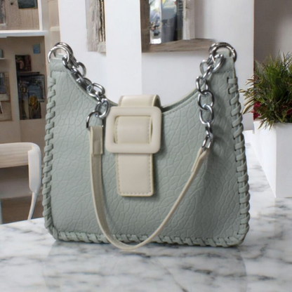 Shockcrush Chic Square Shoulder Bag vegan leather women's handbag on marble surface