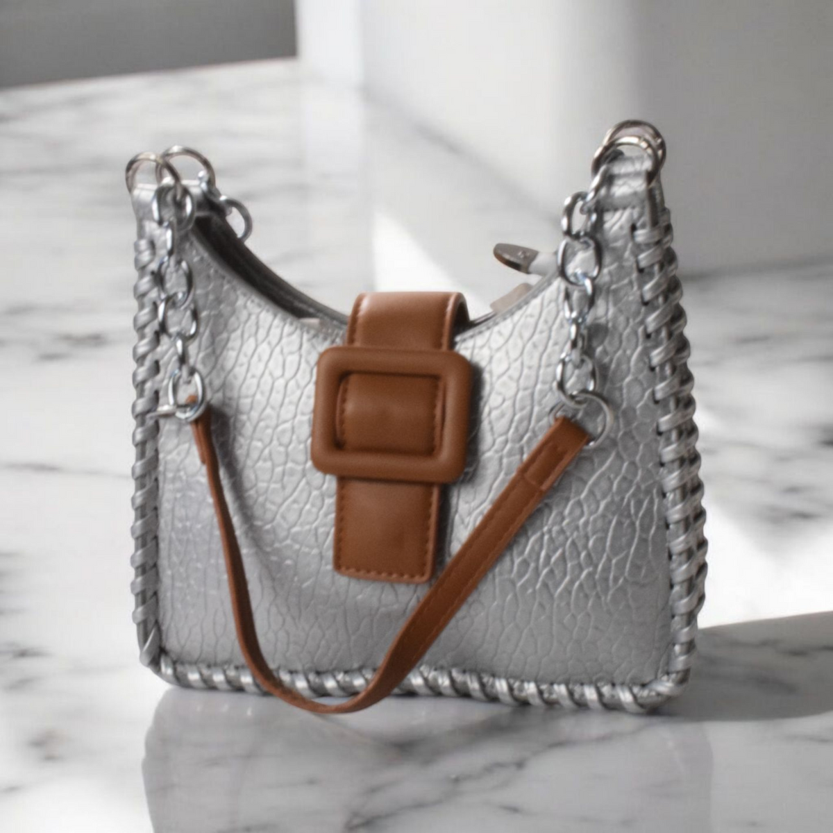 Shockcrush Chic Square Shoulder Bag vegan leather women's handbag on marble surface