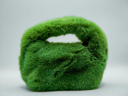 Green fluffy handbag on a white background