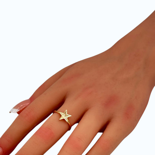 Starlight Ring gold tone star engraved band worn on woman finger